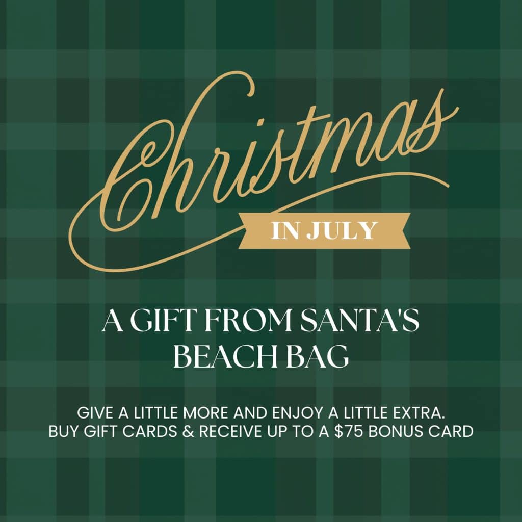 Green plaid promotional poster advertising Christmas in July gift cards with gold script reading 'Christmas' and a beige ribbon 'IN JULY' overlaid, plus white text advertising a gift from Santa's ...